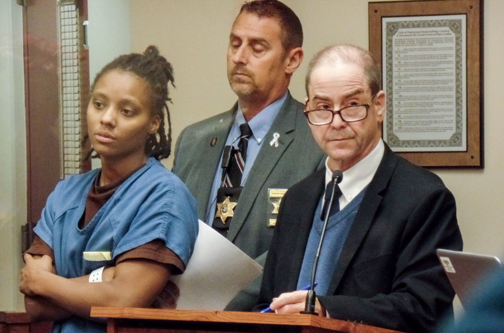 Woman charged in parking ramp shooting says she didn't know victim